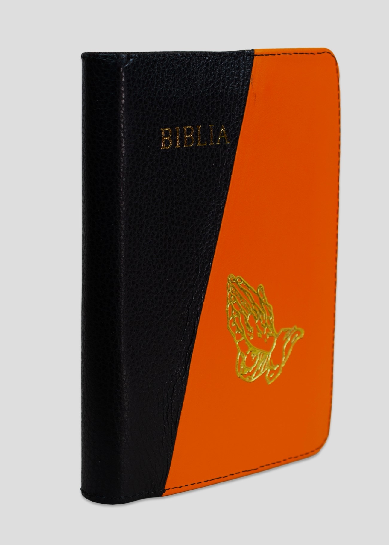 Biblie din piele, marime medie, culoare, negru cu portocaliu,  fermoar, margini albe, simbol maini in rugaciune, cuv. lui Isus cu rosu [053]