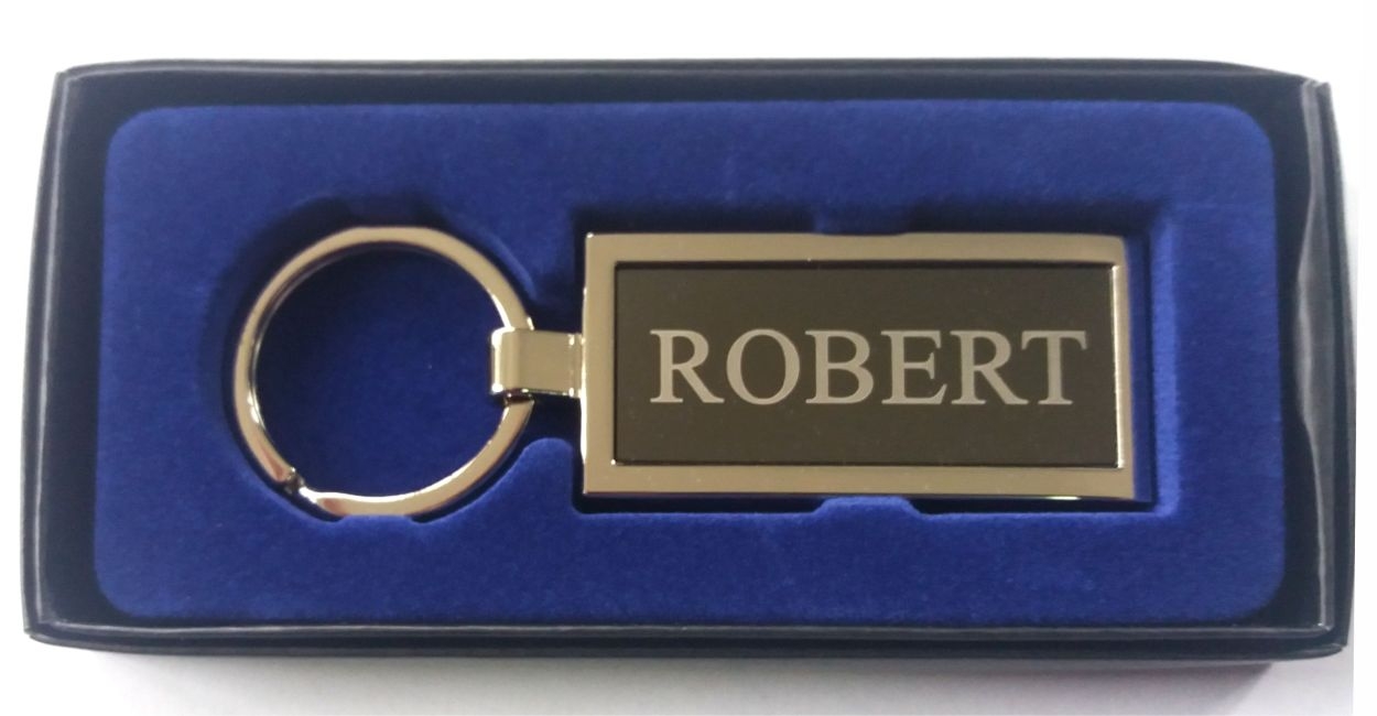 Breloc gravat barbatesc - Robert ( 8 cm x 2.5 cm ) Breloc gravat barbatesc - Robert ( 8 cm x 2.5 cm )