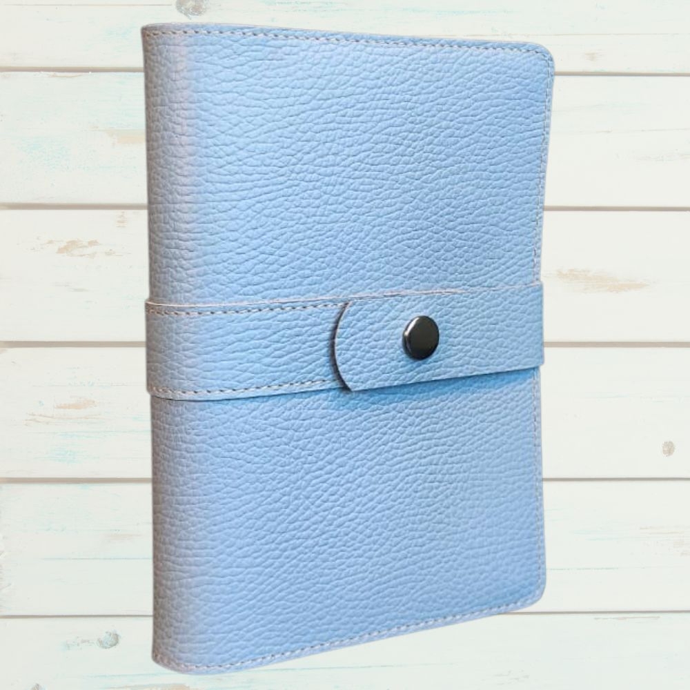 Biblia in husa handmade piele autentica, cu bareta lunga si capsa, marime medie,  bleu ciel,, index, margini aurii, cuv. lui Isus cu rosu [057 HBL]