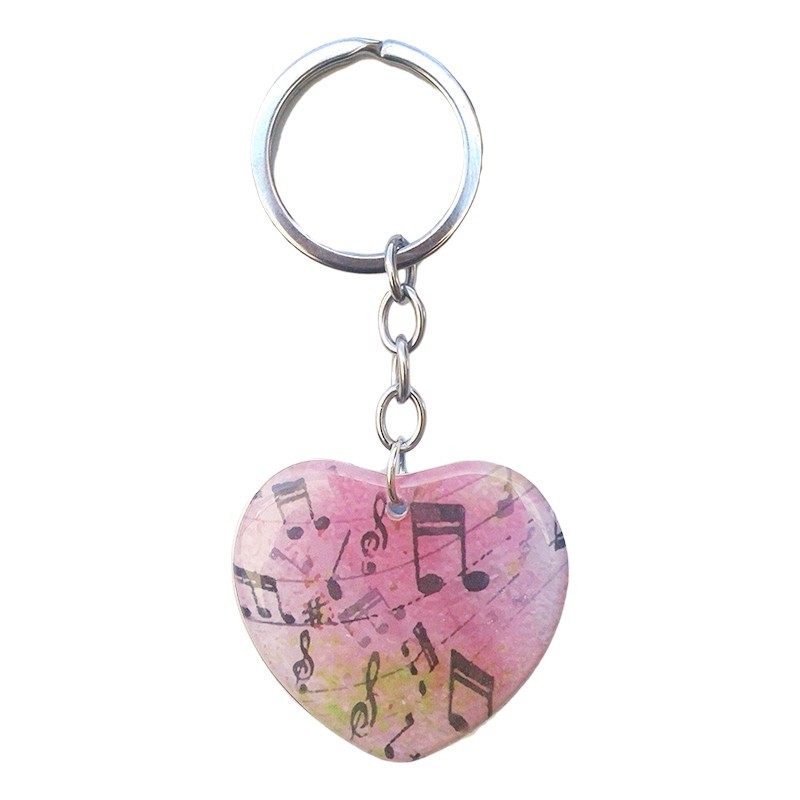 Breloc inima cu note muzicale metal si plastic- Cantati Domnului Breloc inima cu note muzicale metal si plastic- Cantati Domnului