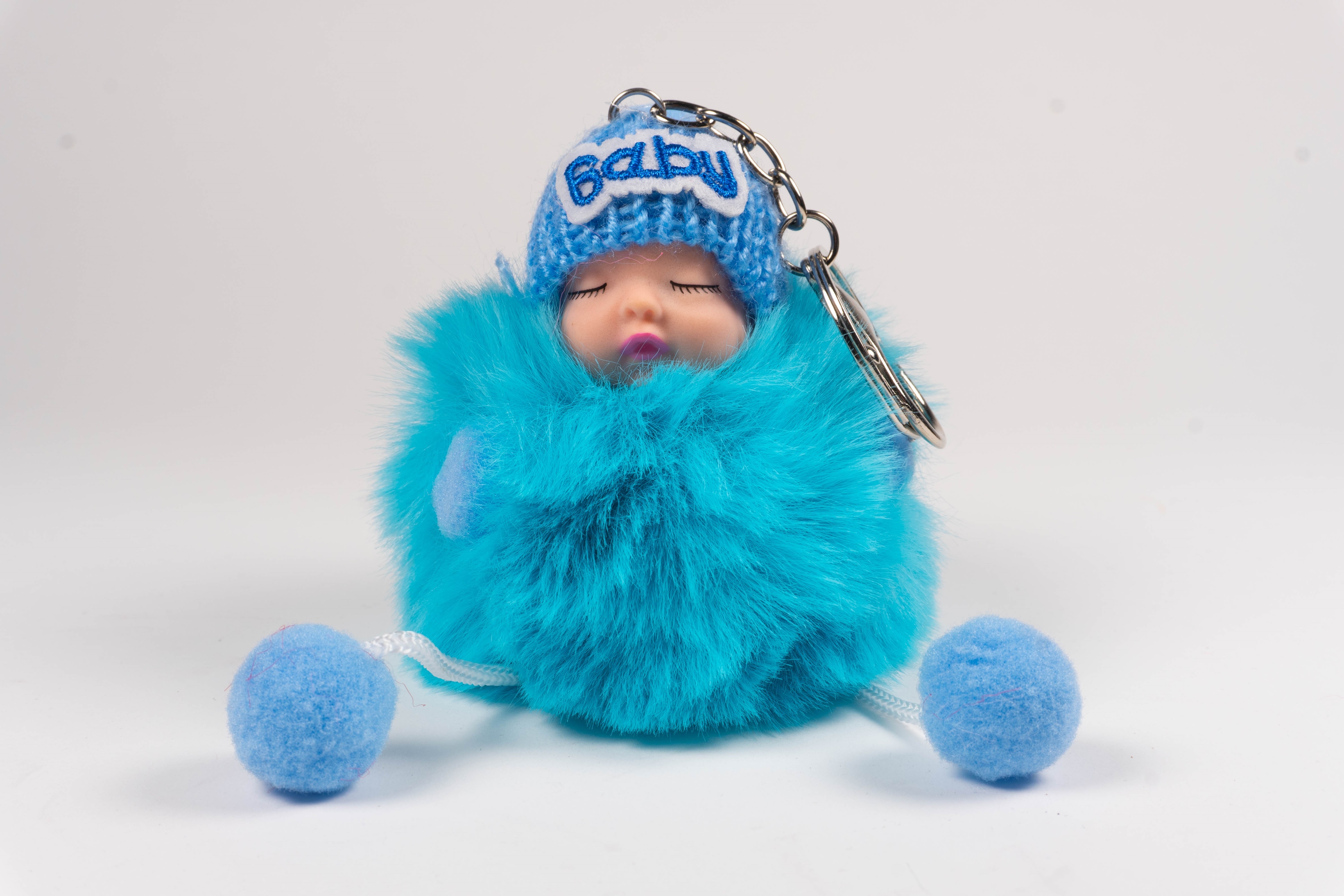 Breloc pufos - Copilas (albastru) Breloc pufos - Copilas (albastru)