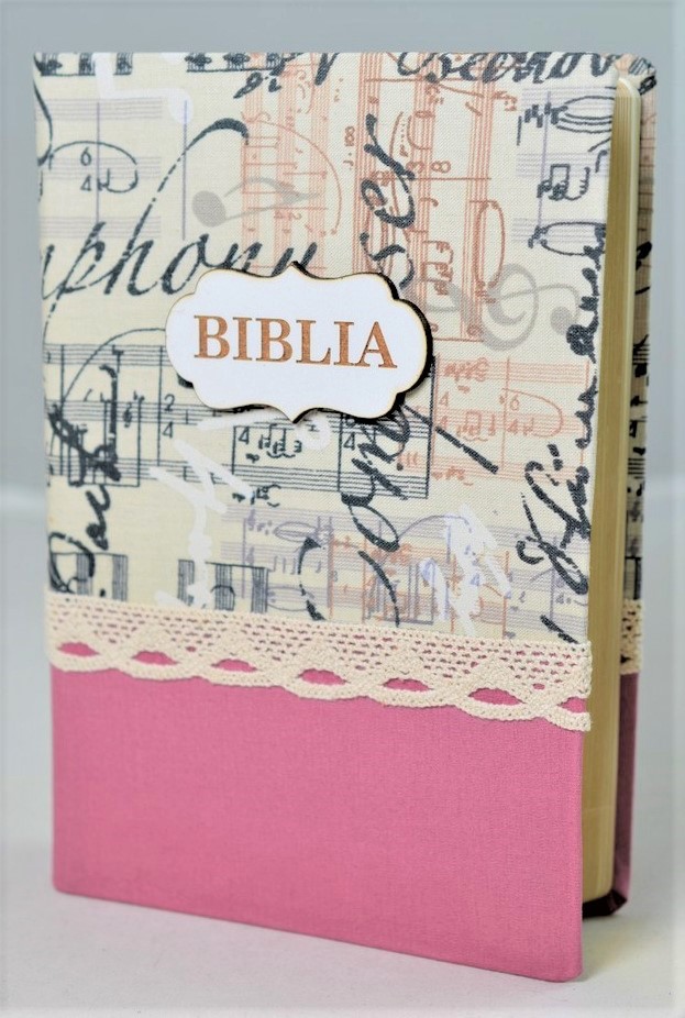 Biblia handmade, marime medie, coperta cartonata textila,roz cu motiv muzical, margini aurii, cuv. lui Isus cu rosu [SI 052 HM]