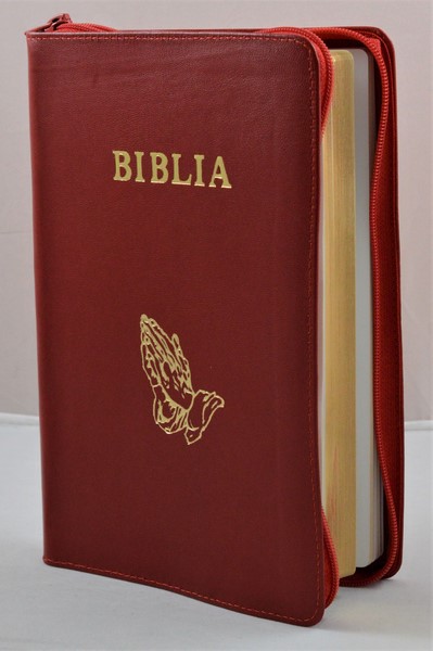 Biblia mare, din piele, culoare rosie, fermoar, margini aurii, simbol - maini in ruga, cuv. lui Isus in rosu [ SB 073 PFR]