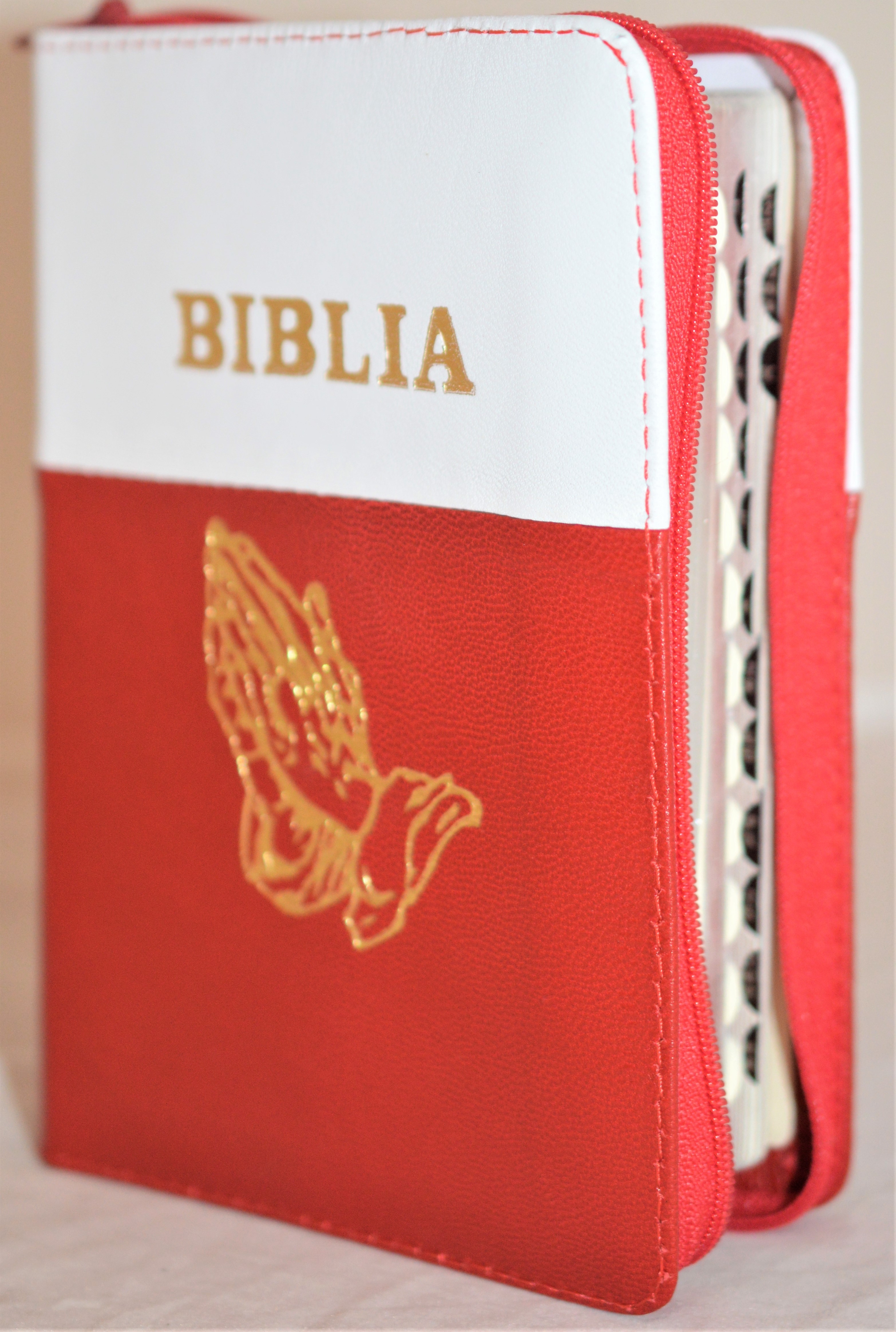 Biblia format mic, din piele, culoare alb cu rosu, index, fermoar, margini argintii, simbolul maini in ruga, cuv. lui Isus in rosu [047 PFI]