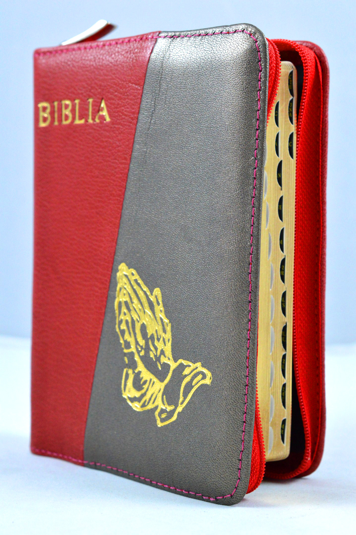 Biblia format mic, din piele, culoare rosu/gri, index, fermoar, margini auriii, simbol maini in ruga, cuv. lui Isus in rosu [047 PFI]