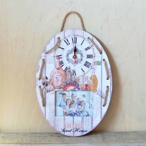 Ceas de perete  oval alb ( 25x35x3.5cm) cu rama foto Ceas de perete  oval alb ( 25x35x3.5cm) cu rama foto