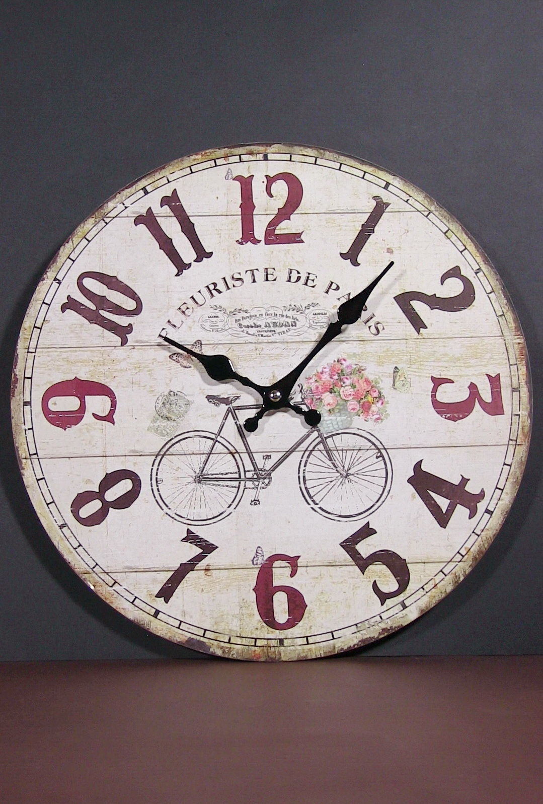 Ceas de perete rotund din lemn - Bicicleta cu flori (34cm) Ceas de perete rotund din lemn - Bicicleta cu flori (34cm)